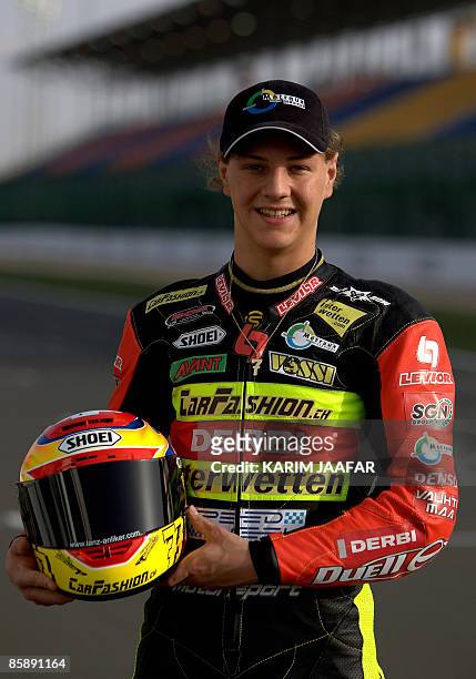 Switzerland's 125cc rider Dominique Aegerter is pictured in the Qatari capital Doha on April 10, 2009. Eight-time world champion Valentino Rossi and...