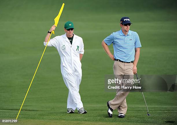 Hunter Mahan waits with his caddie John Wood on the second hole during the second round of the 2009 Masters Tournament at Augusta National Golf Club...