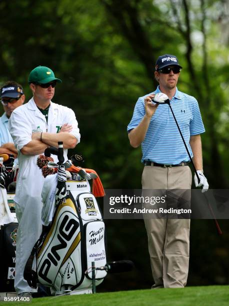 Hunter Mahan waits with his caddie John Wood on the second hole during the second round of the 2009 Masters Tournament at Augusta National Golf Club...