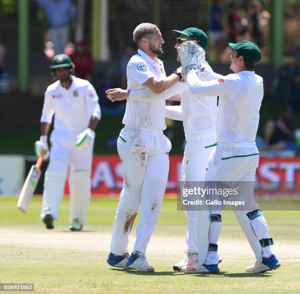 Wayne Parnell of the Proteas celebrates the wicket of Mushfiqur Rahim of Bangladesh with his team mates during day 3 of the 2nd Sunfoil Test match...