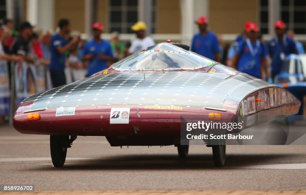 Mississippi Choctaw High School Solar Car Team "Tushka Hashi III" from the United States leaves the start line as they begin racing on Day 1 of the...