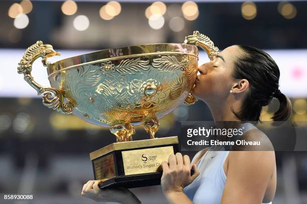 Caroline Garcia of France kisses the winners trophy after winning the Women's Singles final against Simona Halep of Romania on day nine of the 2017...