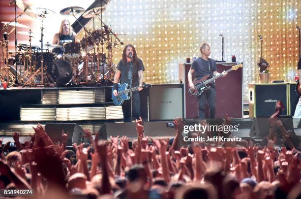 Chris Shiflett, Rami Jaffee, Taylor Hawkins, Dave Grohl, Nate Mendel, Pat Smear of the Foo Fighters performs at Cal Jam 2017 on October 7, 2017 at...