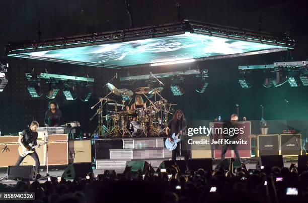 Chris Shiflett, Rami Jaffee, Taylor Hawkins, Dave Grohl, Nate Mendel, Pat Smear of the Foo Fighters performs at Cal Jam 2017 on October 7, 2017 at...