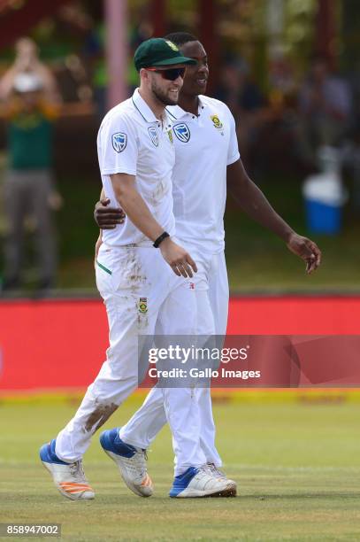 Kagiso Rabada of the Proteas celebrates his 100 test wicket of Mahmudullah of Bangladesh with Wayne Parnell of the Proteas during day 3 of the 2nd...