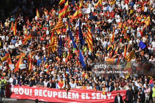 Pro-Unity rally marches through Barcelona in response to last Sundays disputed referendum on Catalan independence on October 8, 2017 in Barcelona,...