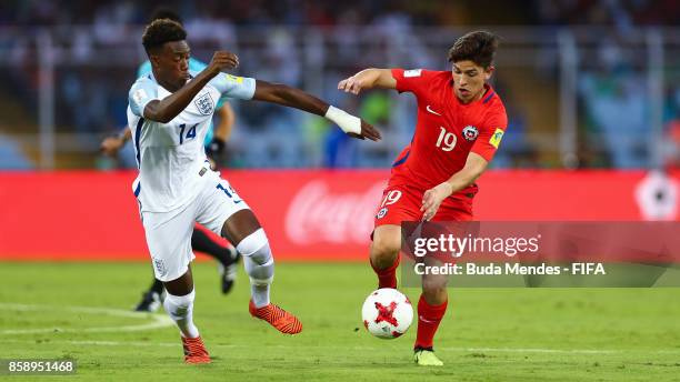 Mauricio Morales of Chile battles for the ball with Callum Hudson-Odoi of England during the FIFA U-17 World Cup India 2017 group F match between...