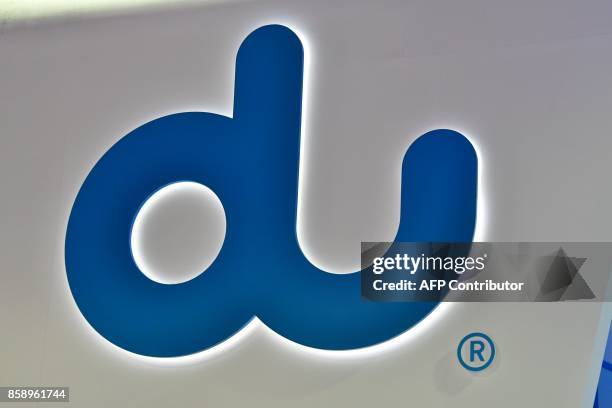 Logo, an emiratee phone network, is seen at the Gitex 2017 exhibition at the Dubai World Trade Center in Dubai on October 8, 2017. / AFP PHOTO /...