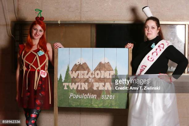 Fans dressed as Twin Peaks characters pose in front of the Welcome to Twin Peaks sign during the Twin Peaks UK Festival 2017 at Hornsey Town Hall...