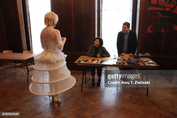 Actress Sherilyn Fenn, who portrayed the character Audrey Horne in the TV show Twin Peaks, welcomes a fan dressed as singer Julee Cruise, during the...