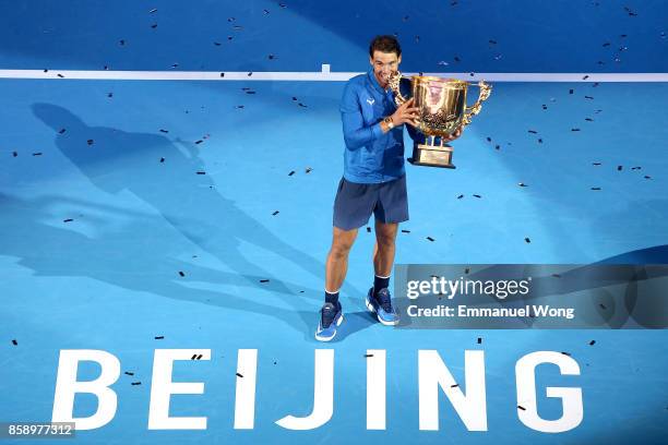 Rafael Nadal of Spain poses with his trophy after winning the Men's singles final match against Nick Kyrgios of Australia on day nine of the 2017...