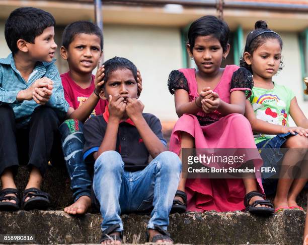 Kids of the orphanage look on as the team of Germany visit the Agnel Technical Education Complex during the FIFA U-17 World Cup India 2017 tournament...