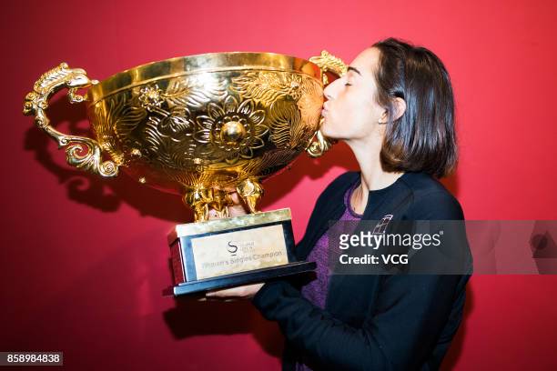 Caroline Garcia of France poses with her trophy for a picture after winning the Women's singles final match against Simona Halep of Romania on day...
