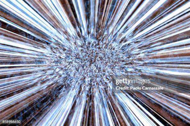 abstract explosion of metal particles - the big bang theory foto e immagini stock