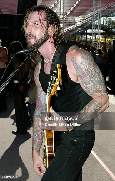 Sevendust guitarist John Connolly performs at X-treme Radio's "Our Big Concert 5" at Sam Boyd Stadium in Las Vegas Sunday, June 16, 2002. The band is...