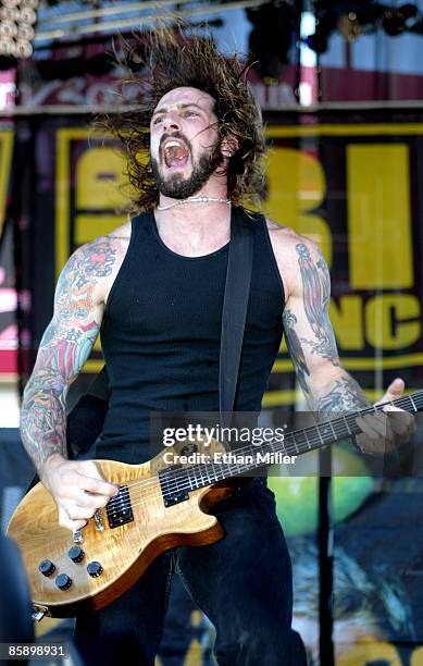 Sevendust guitarist John Connolly performs at KXTE Xtreme Radio's "Our Big Concert 5" at Sam Boyd Stadium June 16, 2002 in Las Vegas, Nevada. The...