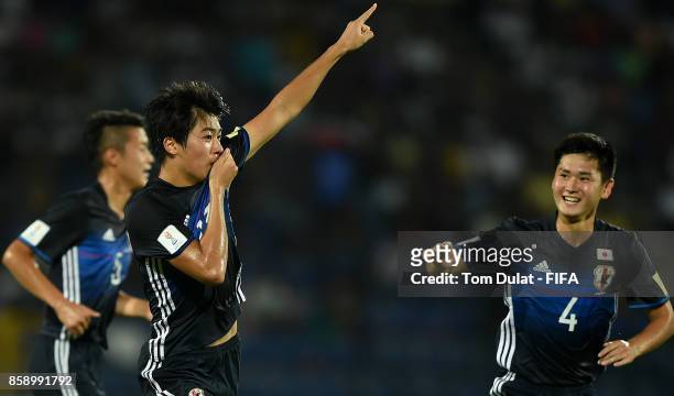 Keito Nakamura of Japan celebrates scoring the opening goal during the FIFA U-17 World Cup India 2017 group E match between Honduras and Japan at...