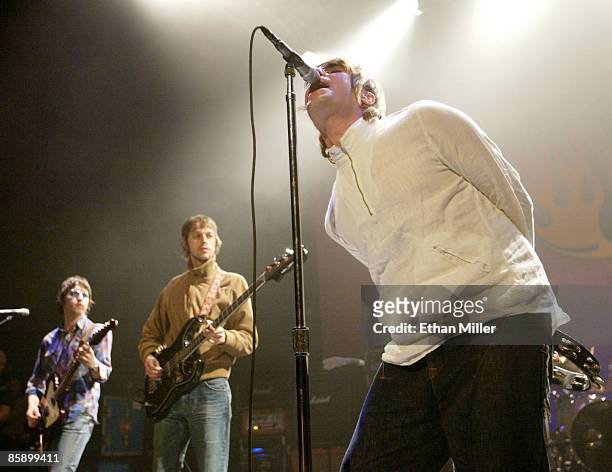 Oasis guitarist Gem Archer, bassist Andy Bell and singer Liam Gallagher perform at The Joint inside the Hard Rock Hotel & Casino April 26, 2002 in...