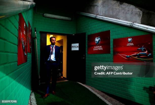 England's Manager Gareth Southgate walks out of the tunnel to look at the pitch at LFF stadionas ahead of the match against Lithuania during the 2018...