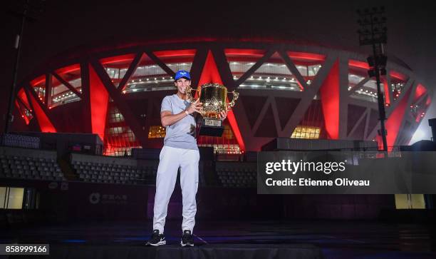 Rafael Nadal of Spain poses for a picture with the winner's trophy after winning the Men's Singles final against Nick Kyrgios of Australia on day...