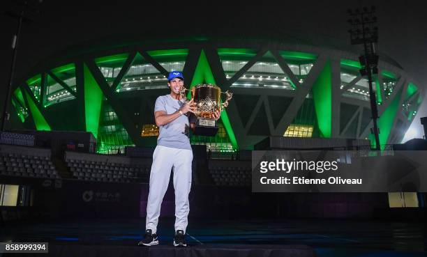 Rafael Nadal of Spain poses for a picture with the winner's trophy after winning the Men's Singles final against Nick Kyrgios of Australia on day...