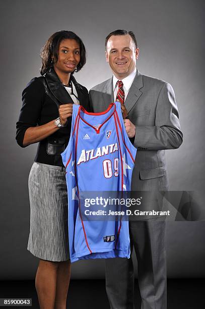 Number one overall pick Angel McCoughtry of the Atlanta Dream poses for a portrait with her college coach Jeff Walz of the University of Louisville...