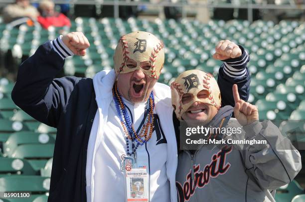Detroit Tigers fans show their support during the opening day game against the Texas Rangers at Comerica Park on April 10, 2009 in Detroit, Michigan....