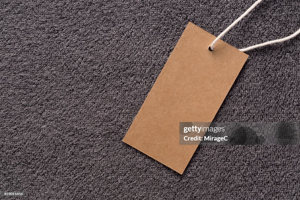 Blank Kraft Label on Towel Background