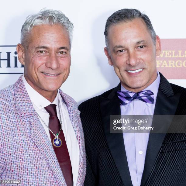 Olympic Gold Medal winning diver Greg Louganis and paralegal Johnny Chaillot arrives for the Point Honors Los Angeles at The Beverly Hilton Hotel on...