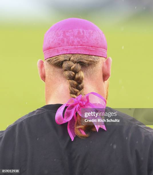 Beau Allen of the Philadelphia Eagles warms up with a pink ribbon on his ponytail prior to the game against the Arizona Cardinals at Lincoln...