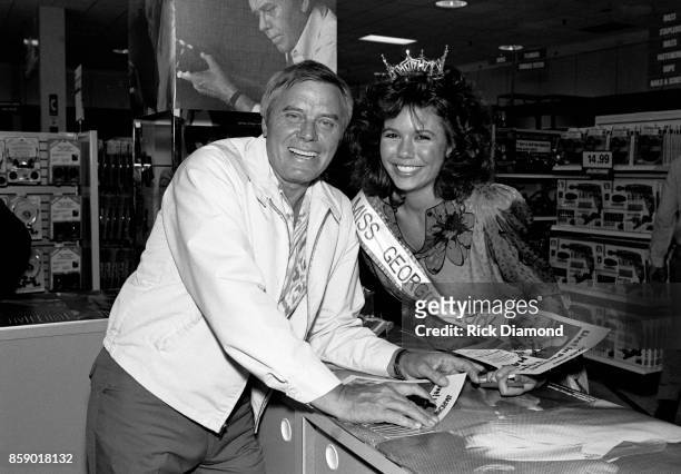 Singer/Songwriter Tom T. Hall signs autographs and meets with fans at Turtle's Records & Tapes in Atlanta Georgia April 03, 1985