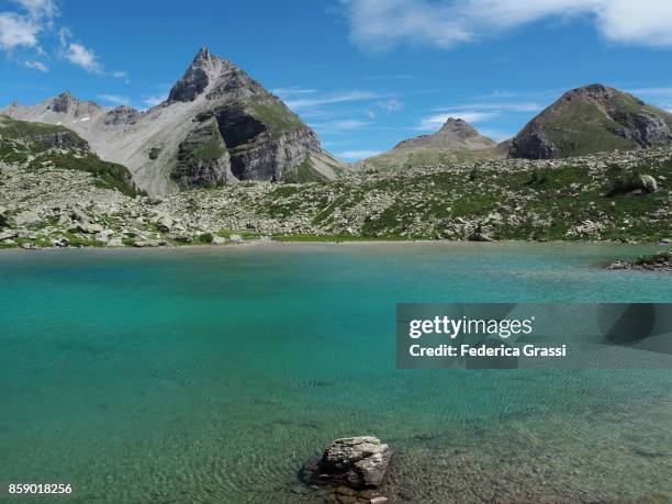 alpine lake (lago bianco) at alpe veglia natural park - veglia ストックフォトと画像