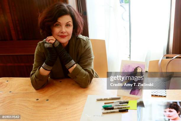 Actress Sherilyn Fenn, who portrayed the character Audrey Horne in the TV series Twin Peaks poses for a photograph during the Twin Peaks UK Festival...
