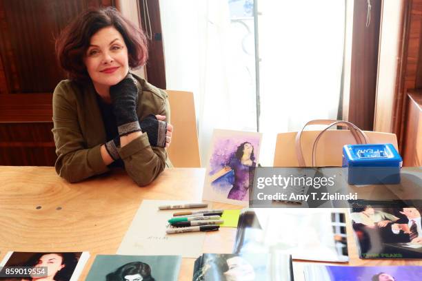 Actress Sherilyn Fenn, who portrayed the character Audrey Horne in the TV series Twin Peaks, poses for a photograph during the Twin Peaks UK Festival...