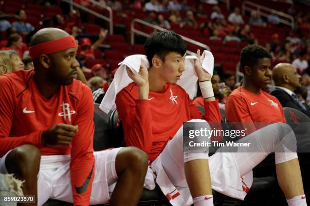 Zhou Qi of Houston Rockets rests on the bench during the second half against the Shanghai Sharks at Toyota Center on October 5, 2017 in Houston,...