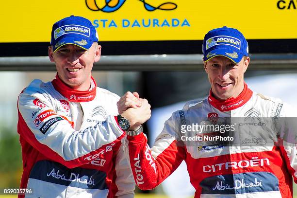 The British driver Kris Meek and his co-driver Paul Nagle of Citron Total Abu Dhabi Wrt, celebrating his victory during the podium ceremony of the...