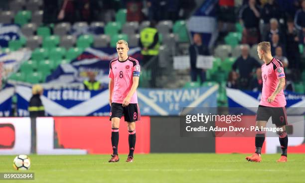 Scotland's Darren Fletcher appears dejected after Slovenia's Roman Bezjak scores an equalizing goal during the 2018 FIFA World Cup Qualifying Group F...