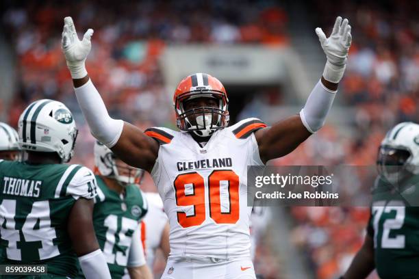 Emmanuel Ogbah of the Cleveland Browns celebrates a play in the first quarter against the New York Jets at FirstEnergy Stadium on October 8, 2017 in...