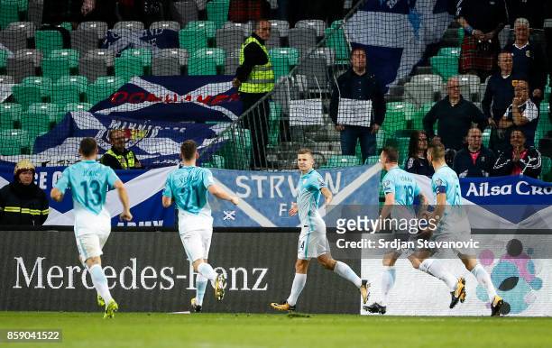 Roman Bezjak of Slovenia celebrate scores the goal with the team mates during the FIFA 2018 World Cup Qualifier match between Slovenia and Scotland...