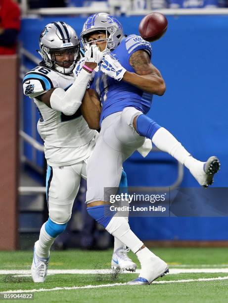 Daryl Worley of the Carolina Panthers breaks up a pass intended for Marvin Jones of the Detroit Lions during the first quarter at Ford Field on...