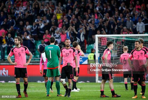 Players of national football team of Scotland look dejected after the FIFA 2018 World Cup Qualifier match between Slovenia and Scotland at stadium...