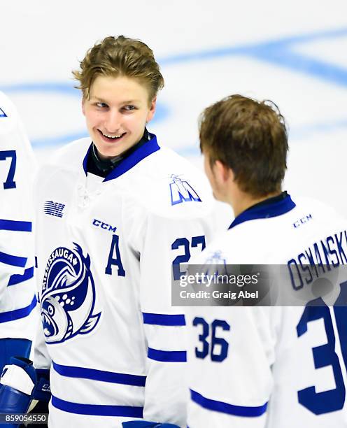 Jacob Moverare and Austin Osmanski of the Mississauga Steelheads have a chuckle prior to a game against the Sudbury Wolves on October 6, 2017 at...