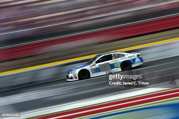 Dale Earnhardt Jr., driver of the Nationwide Chevrolet, races during the Monster Energy NASCAR Cup Series Bank of America 500 at Charlotte Motor...