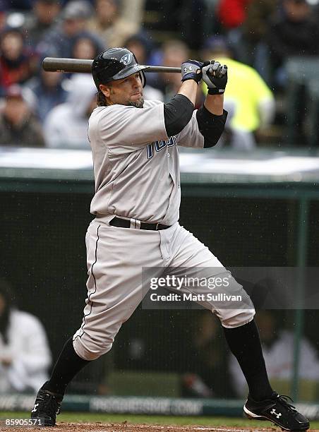 Kevin Millar of the Toronto Blue Jays drives in a run against the Cleveland Indians in the fourth inning April 10, 2009 at Progressive Field in...