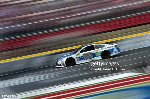 Dale Earnhardt Jr., driver of the Nationwide Chevrolet, races during the Monster Energy NASCAR Cup Series Bank of America 500 at Charlotte Motor...