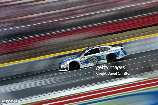 Dale Earnhardt Jr., driver of the Nationwide Chevrolet, races during the Monster Energy NASCAR Cup Series Bank of America 500 at Charlotte Motor...