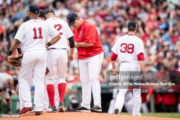 Manager John Farrell of the Boston Red Sox removes Doug Fister during the second inning of game three of the American League Division Series against...