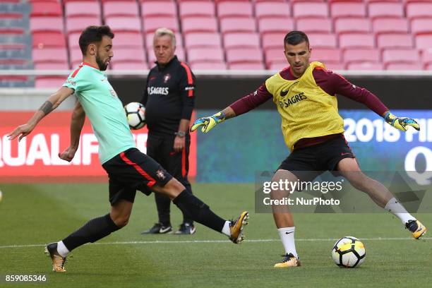 Portugals goalkeeper Anthony Lopes and Portugals midfielder Bruno Fernandes in action during National Team Training session before the match between...