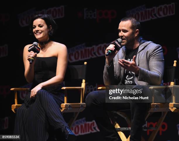 Jamie Alexander and Sullivan Stapleton speak onstage during the Blindspot panel 2017 New York Comic Con - Day 4 on October 8, 2017 in New York City.