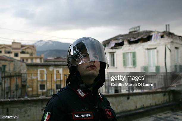 An Italian Paramilitary Police "Carabinieri" Officer patrols the old center to prevent looting on April 10, 2009 in L'Aquila, Italy. The 6.3...